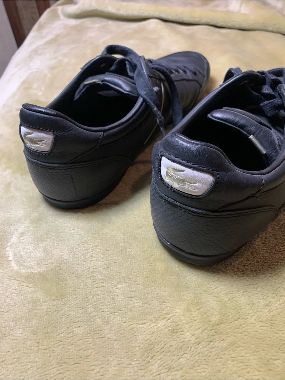 Lacoste Black Leather Low-Top Sneakers with Gold Accents